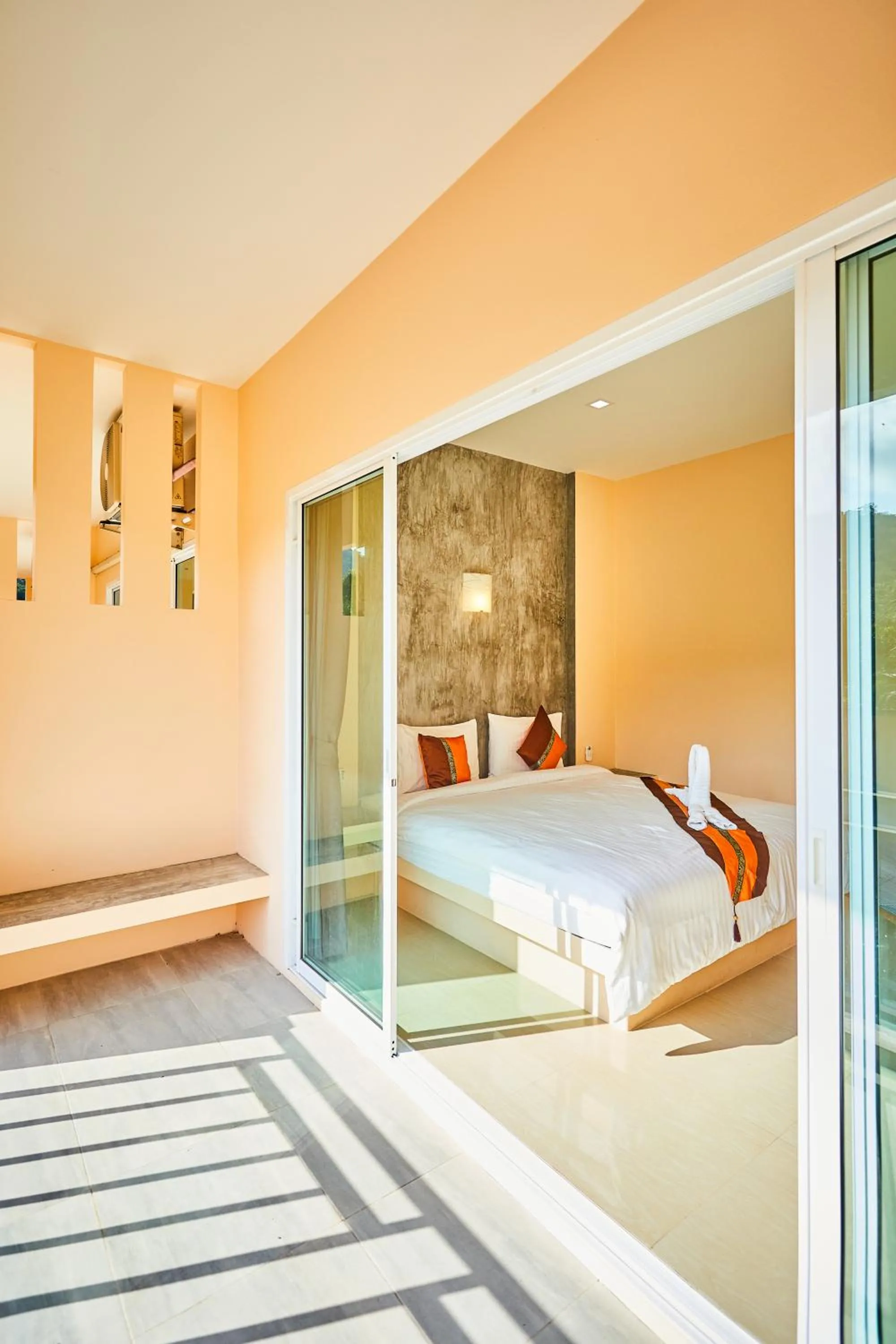 Bed in Coco Palm Hotel Koh tao