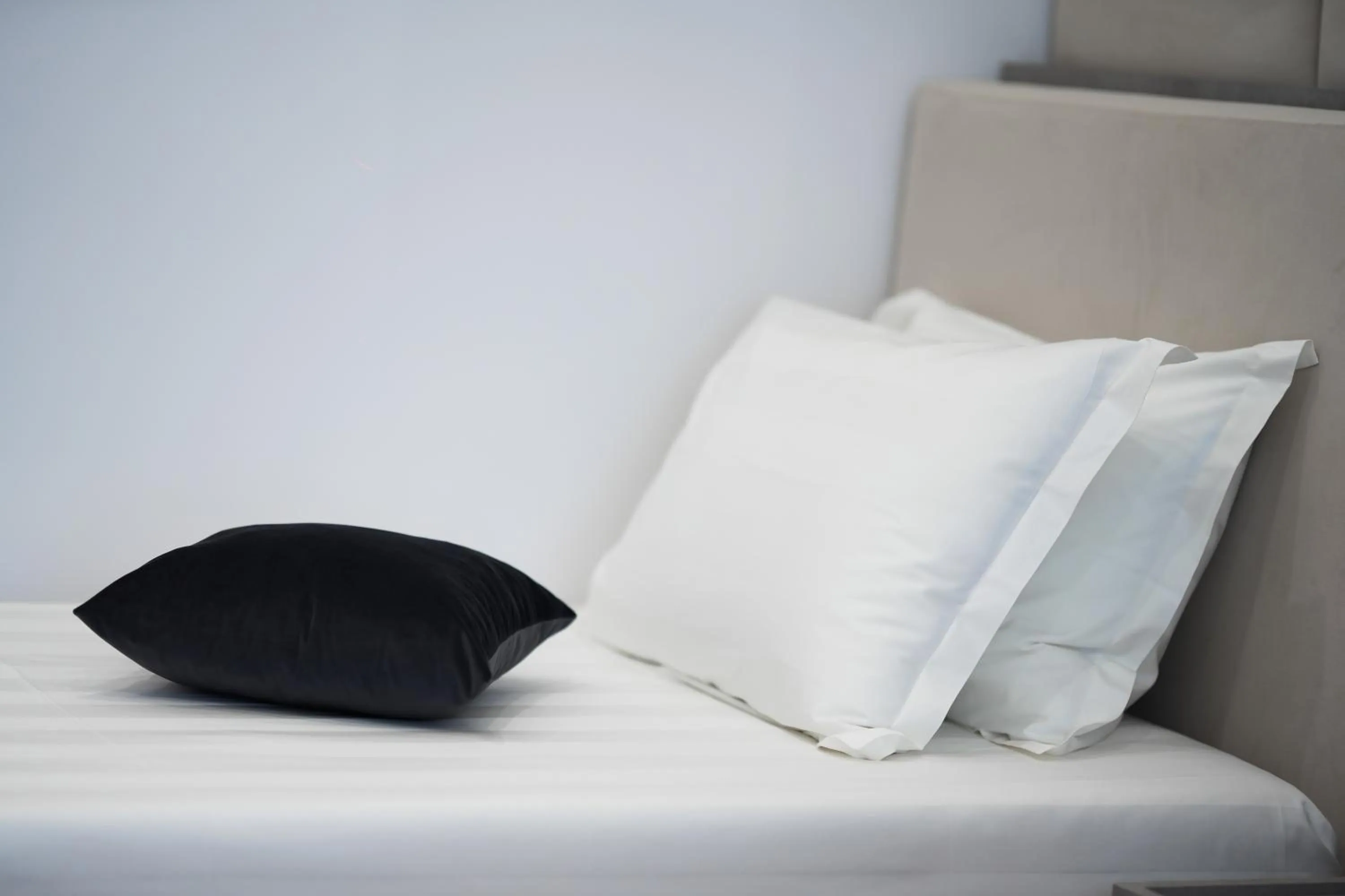 Bed in Naos Luxury Hotel