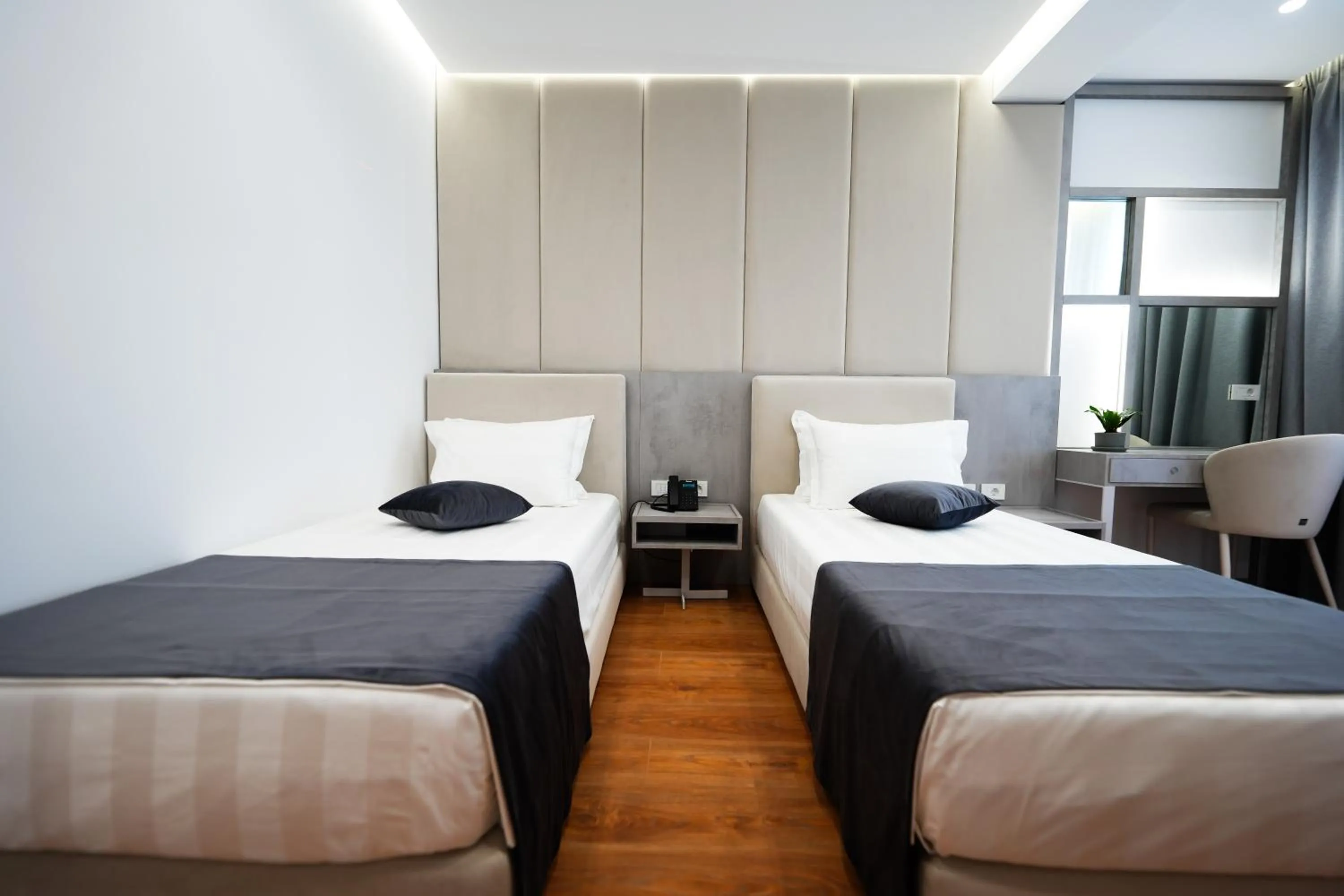 Photo of the whole room, Bed in Naos Luxury Hotel