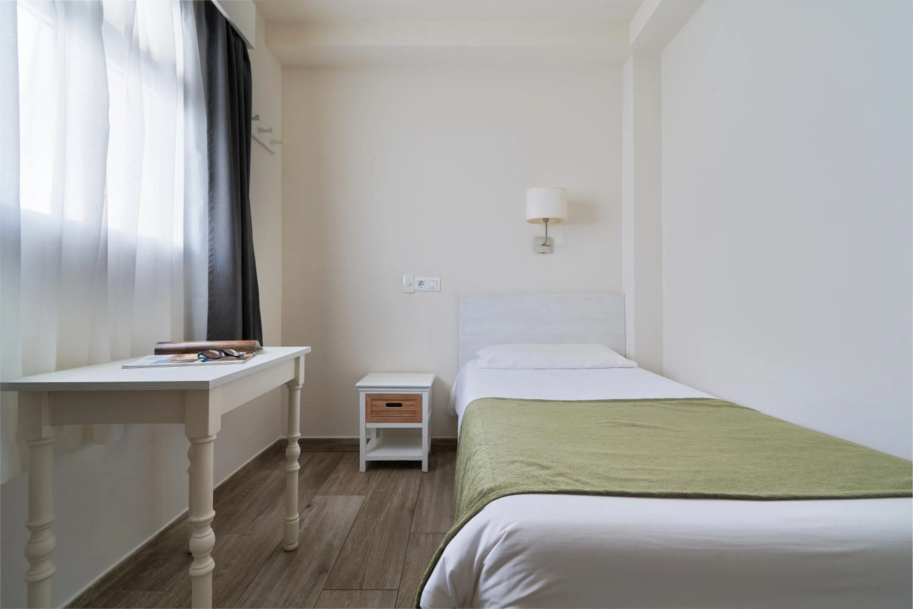 Bed in Hostal Sol y Miel