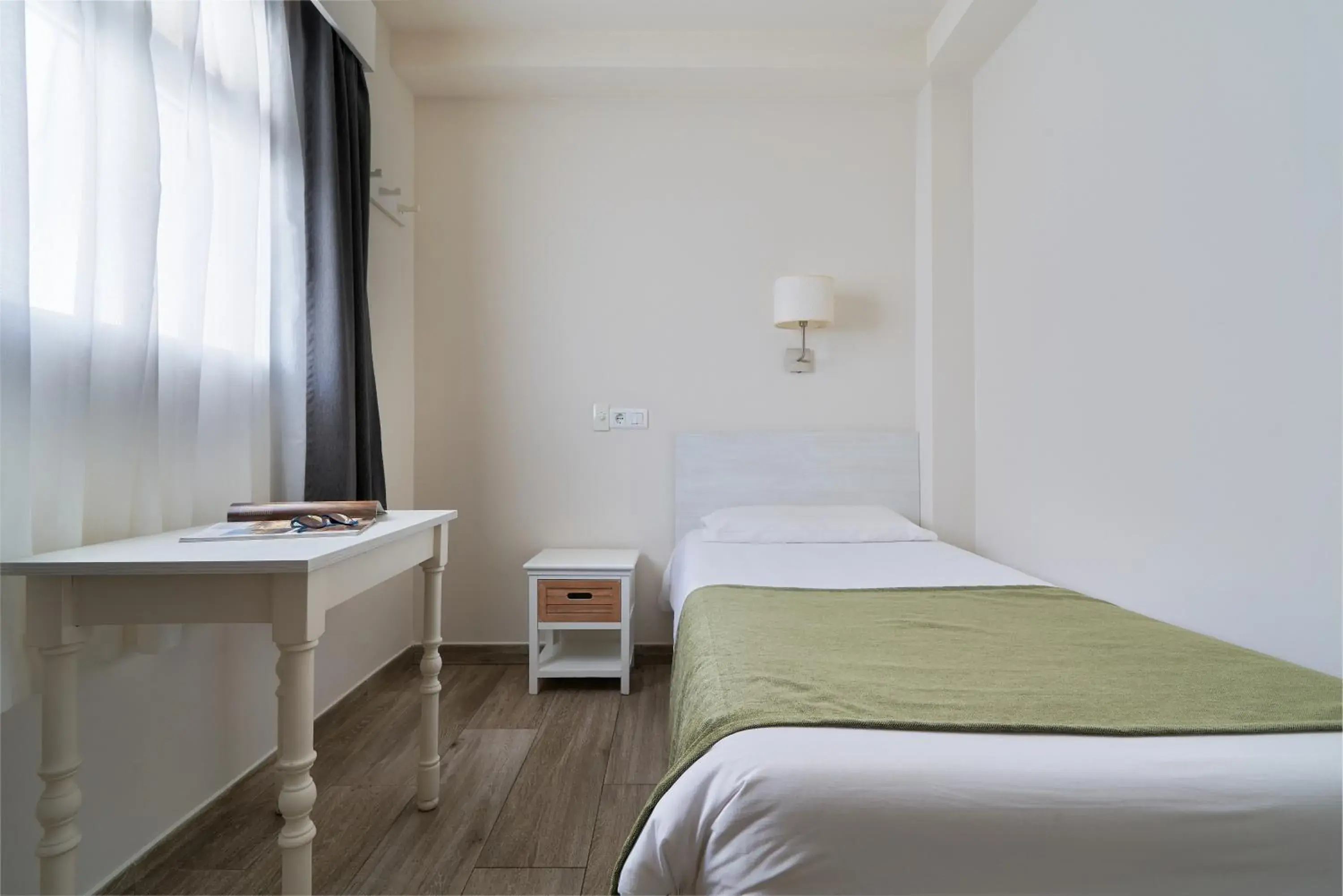 Bed in Hostal Sol y Miel Bed in Hostal Sol y Miel