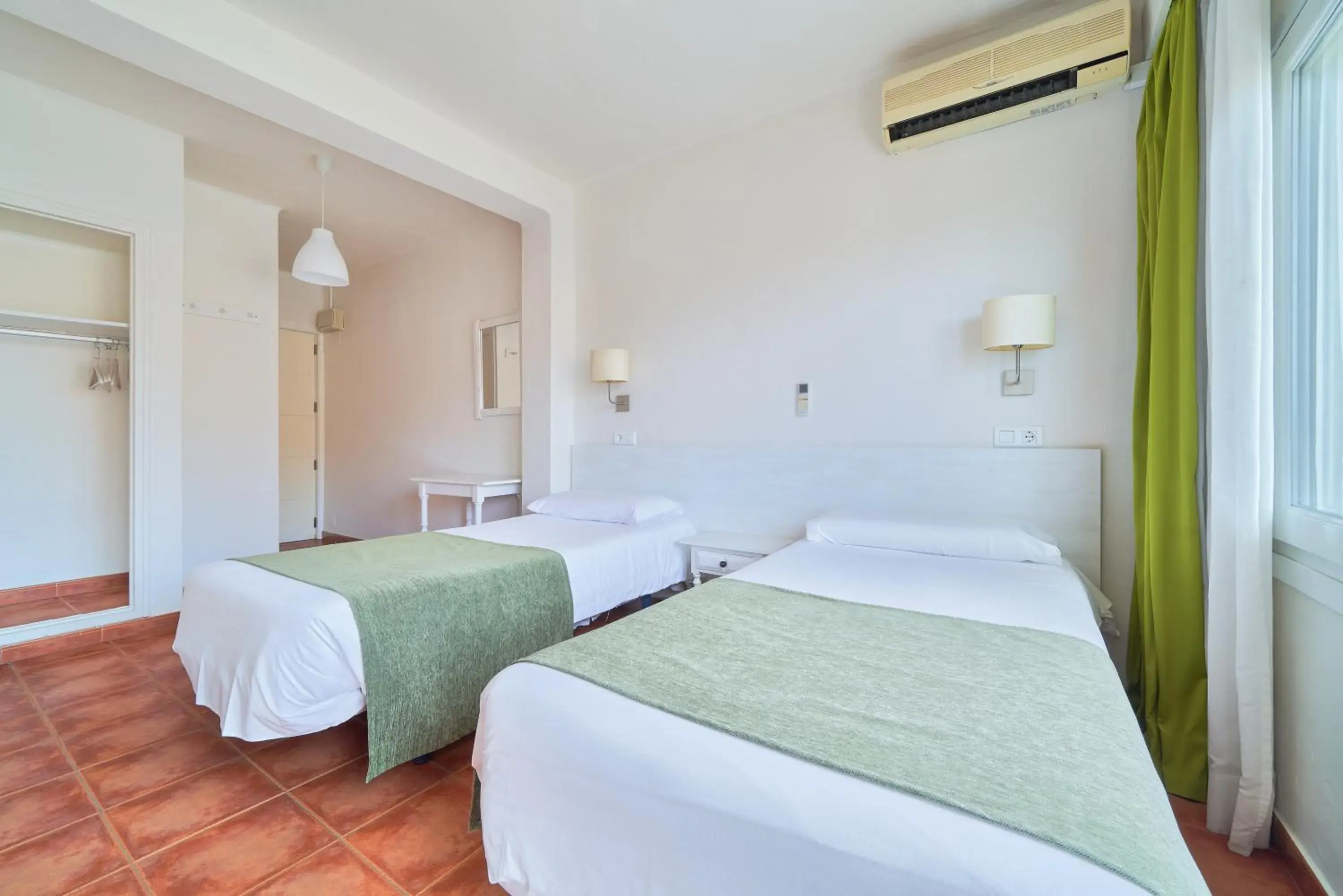 Bed in Hostal Sol y Miel Bed in Hostal Sol y Miel