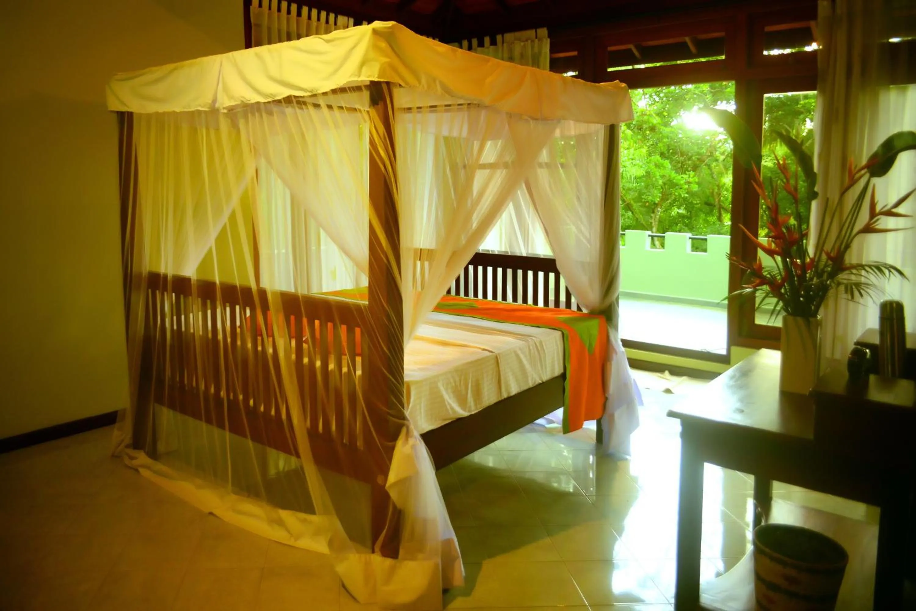 Bedroom in Tropical Retreat