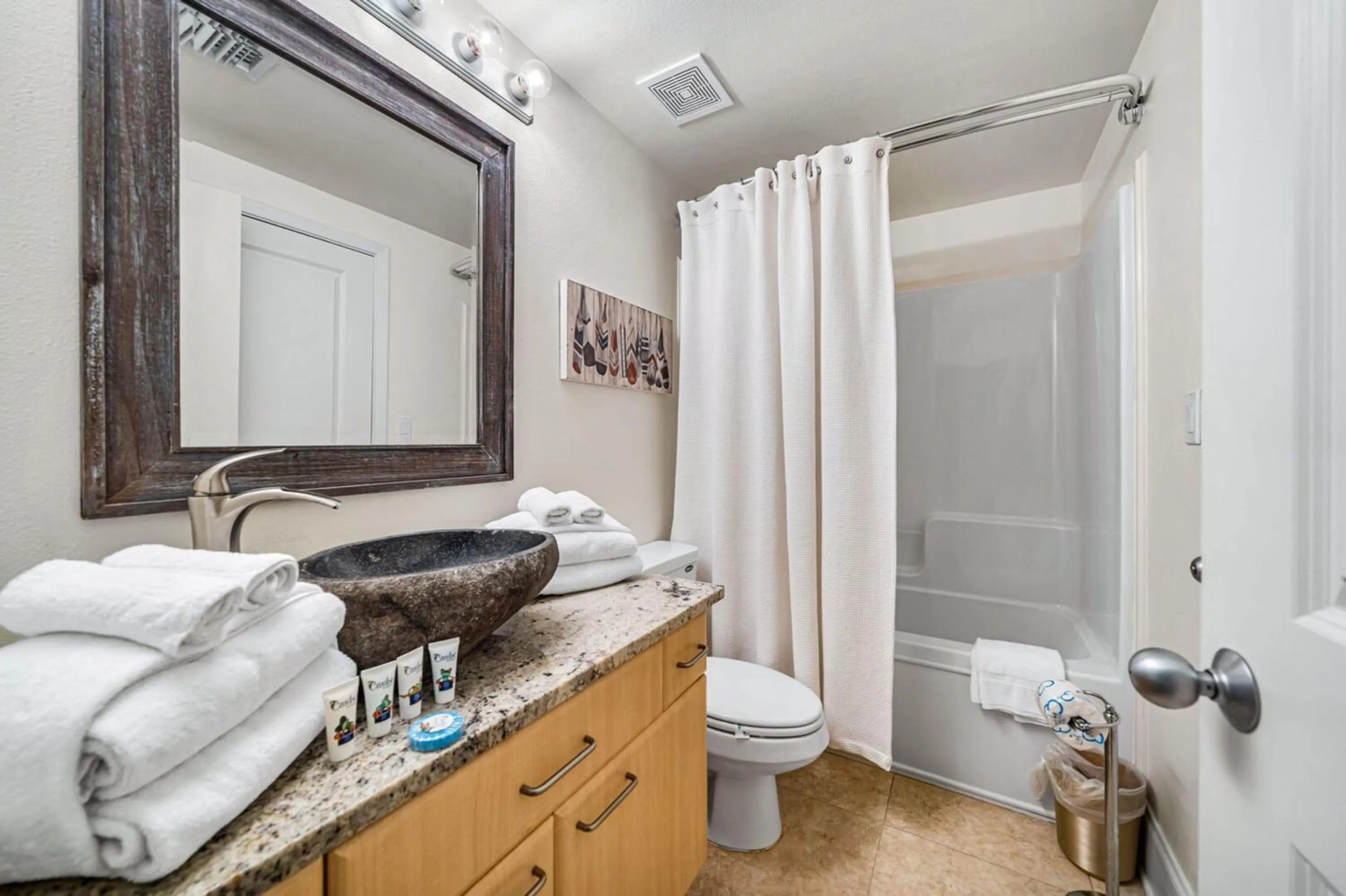 Bathroom in Caribe Resort by Hosteeva