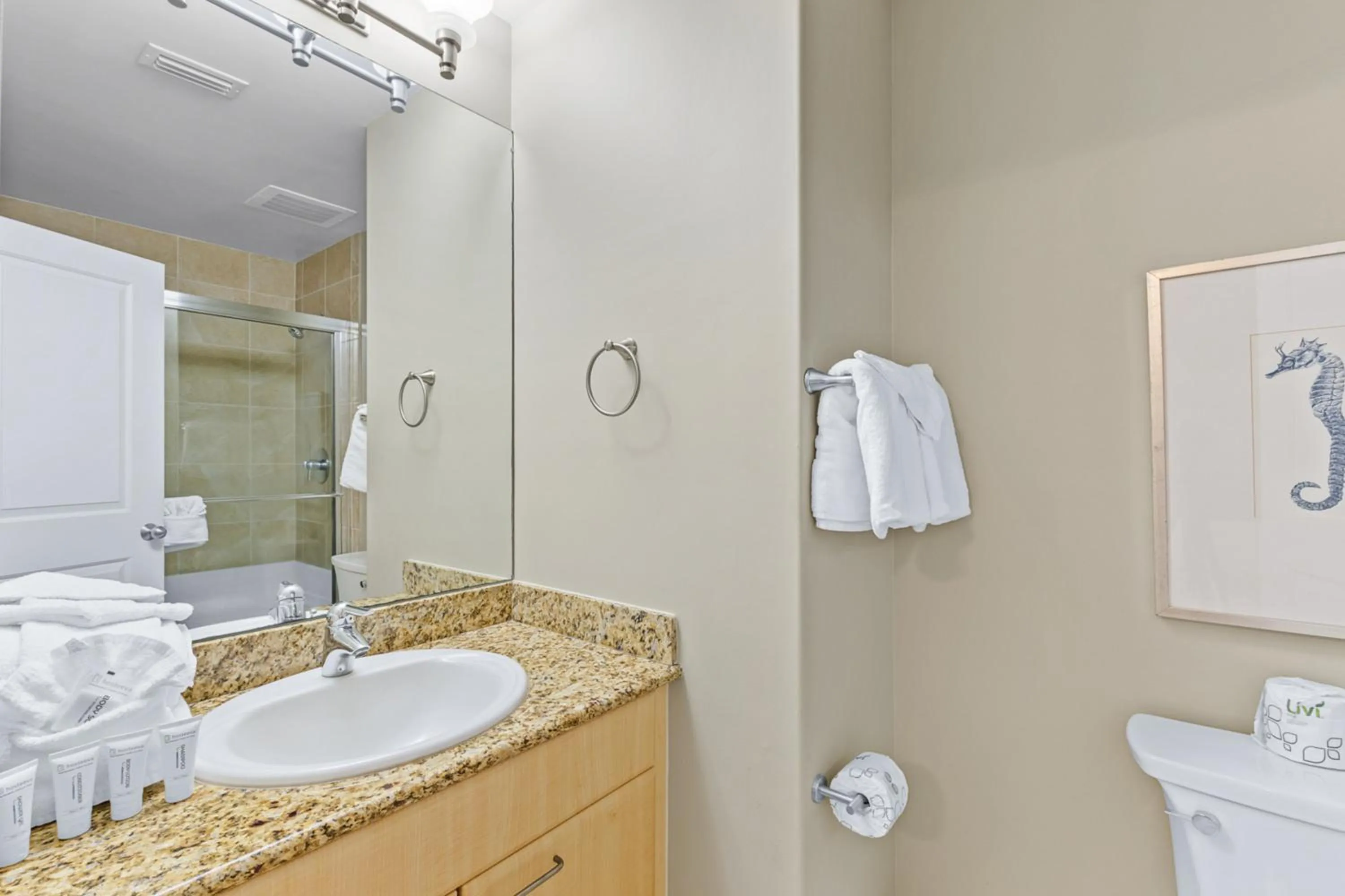 Bathroom in Caribe Resort by Hosteeva