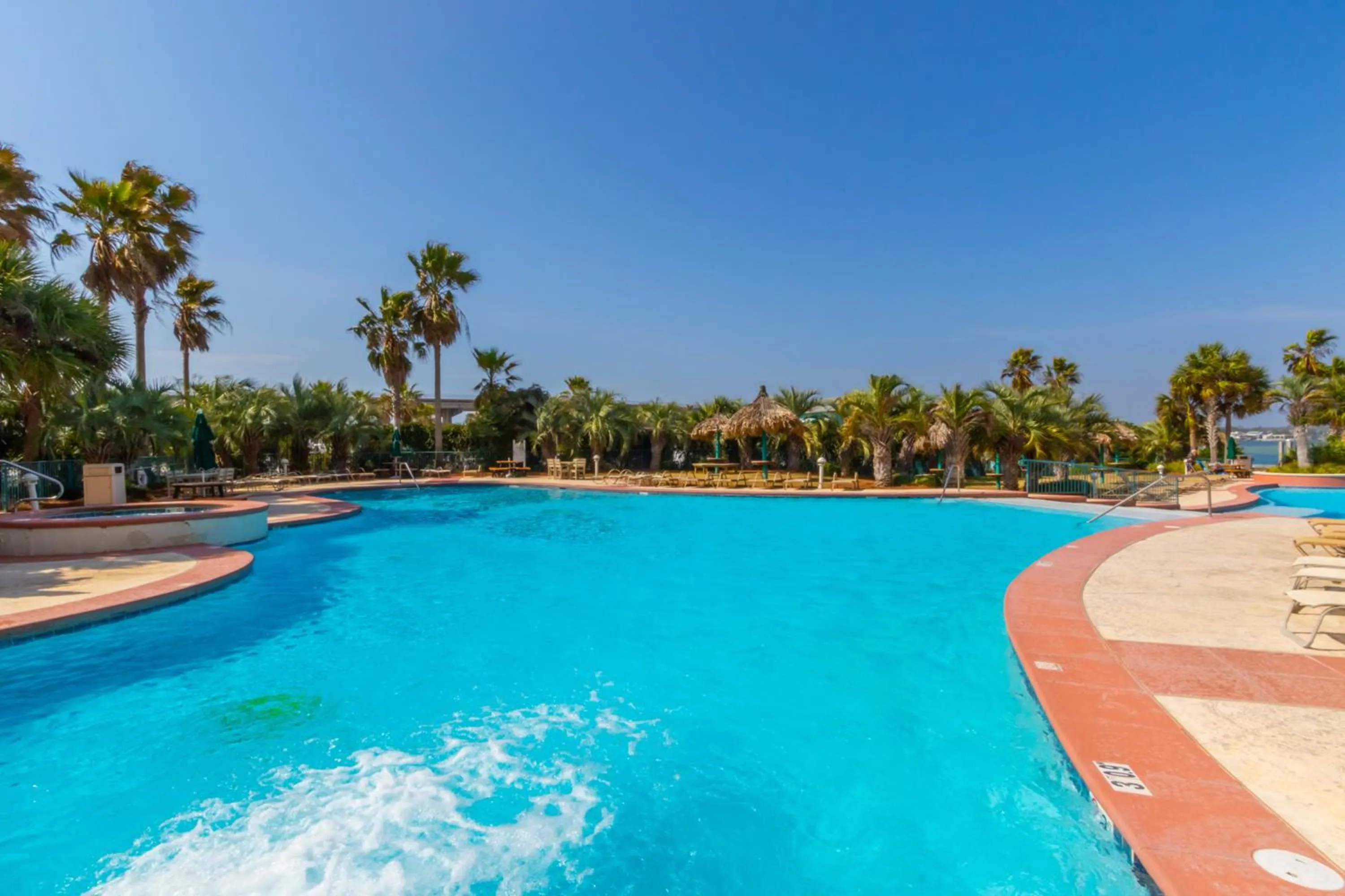 Swimming pool in Caribe Resort by Hosteeva