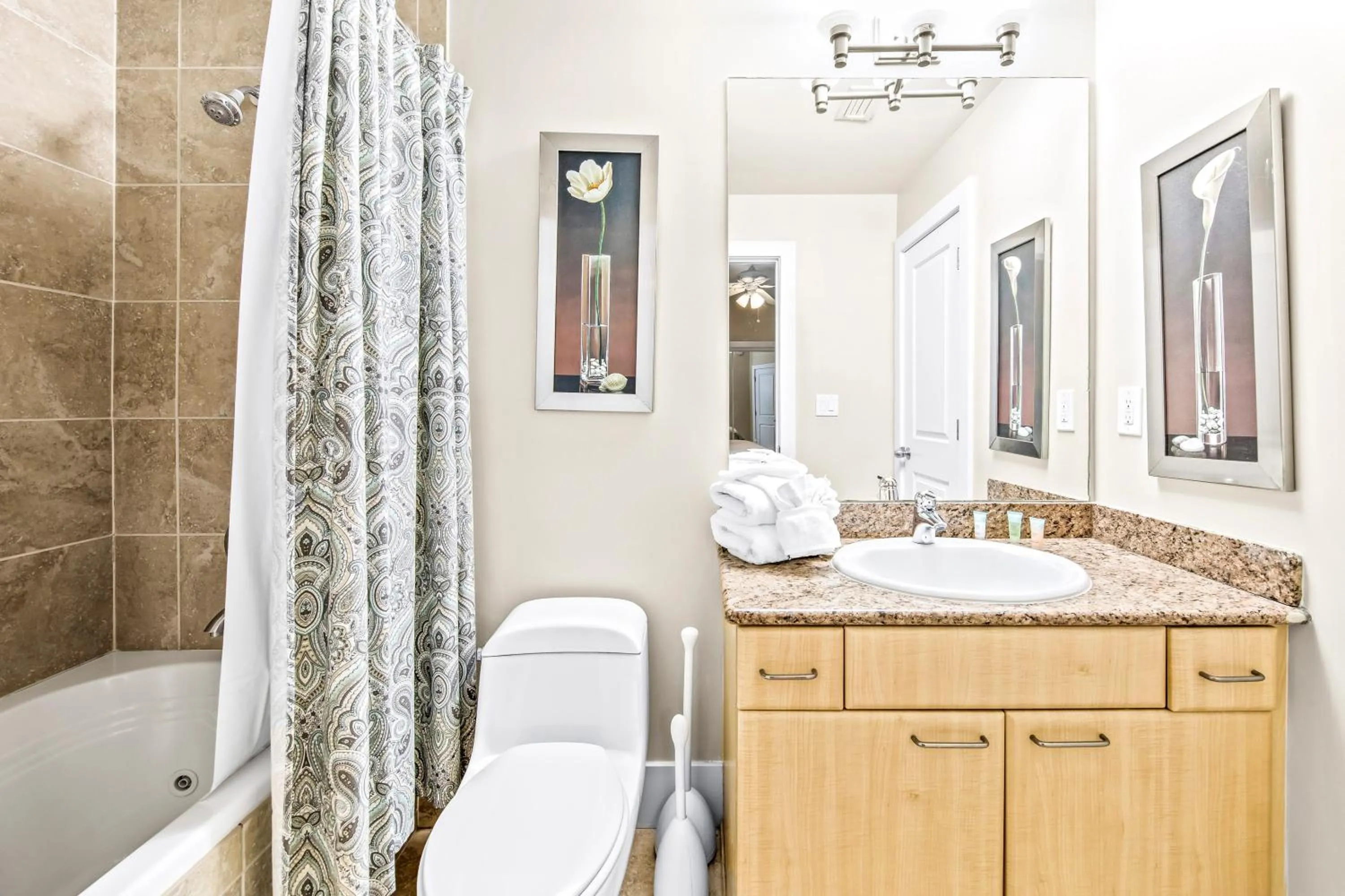 Bathroom in Caribe Resort by Hosteeva