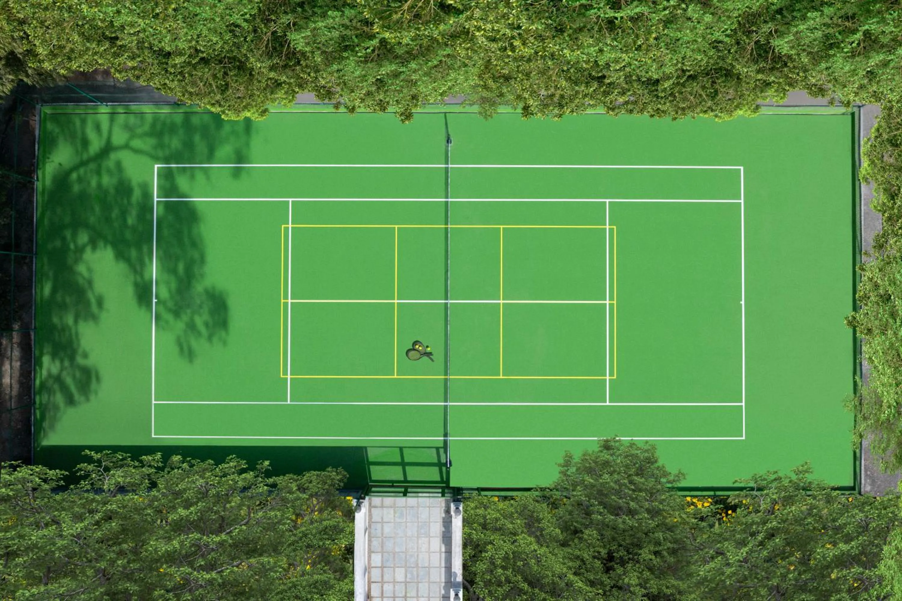 Tennis court in Welcomhotel by ITC Hotels, Rama International, Aurangabad