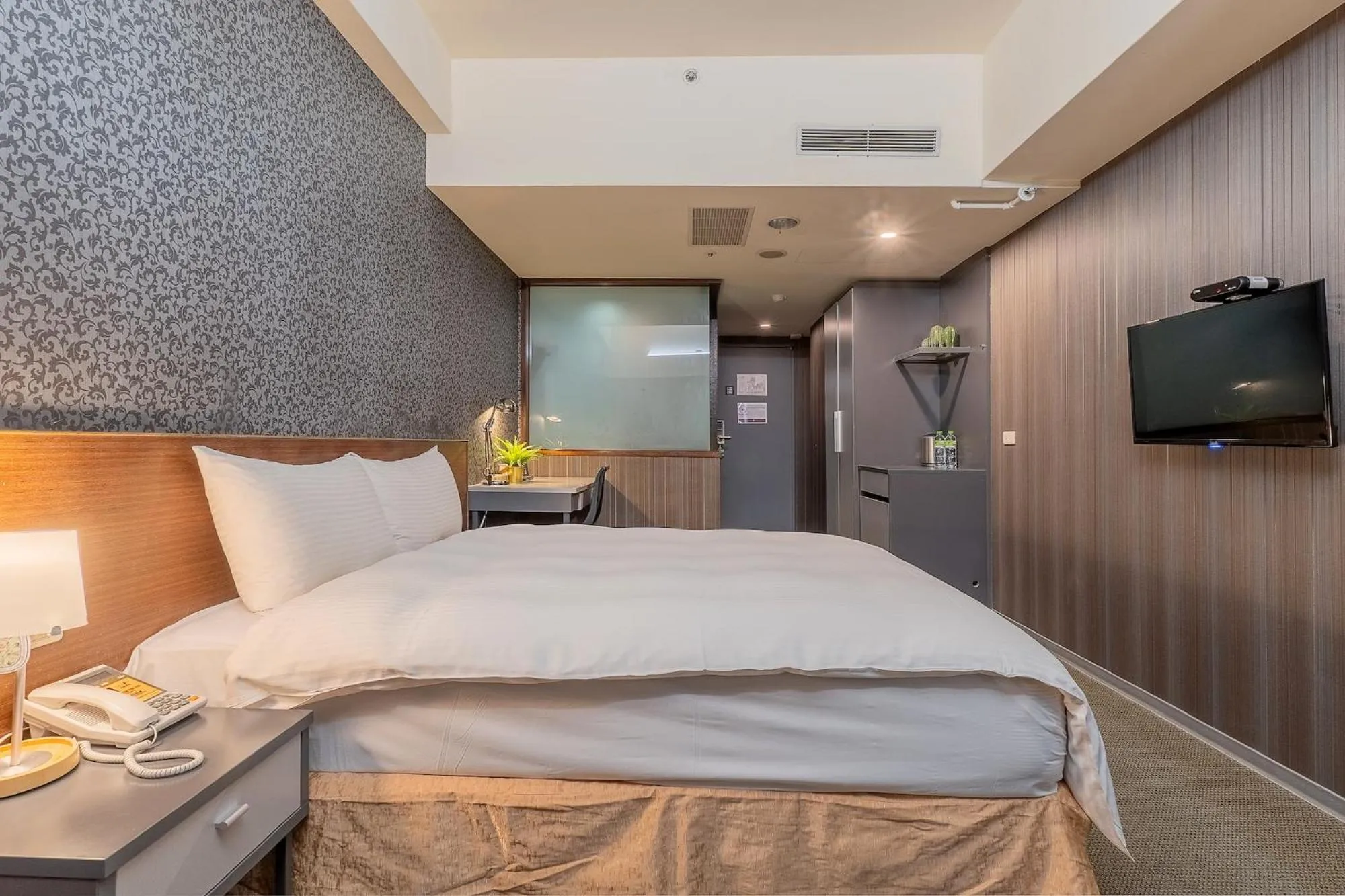 Bed in The Galerie Hotel