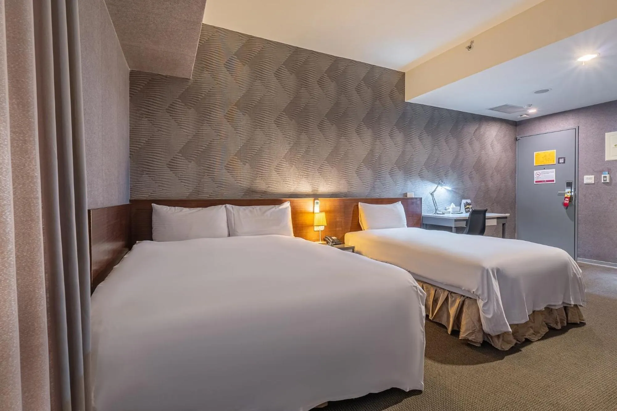 Bed in The Galerie Hotel