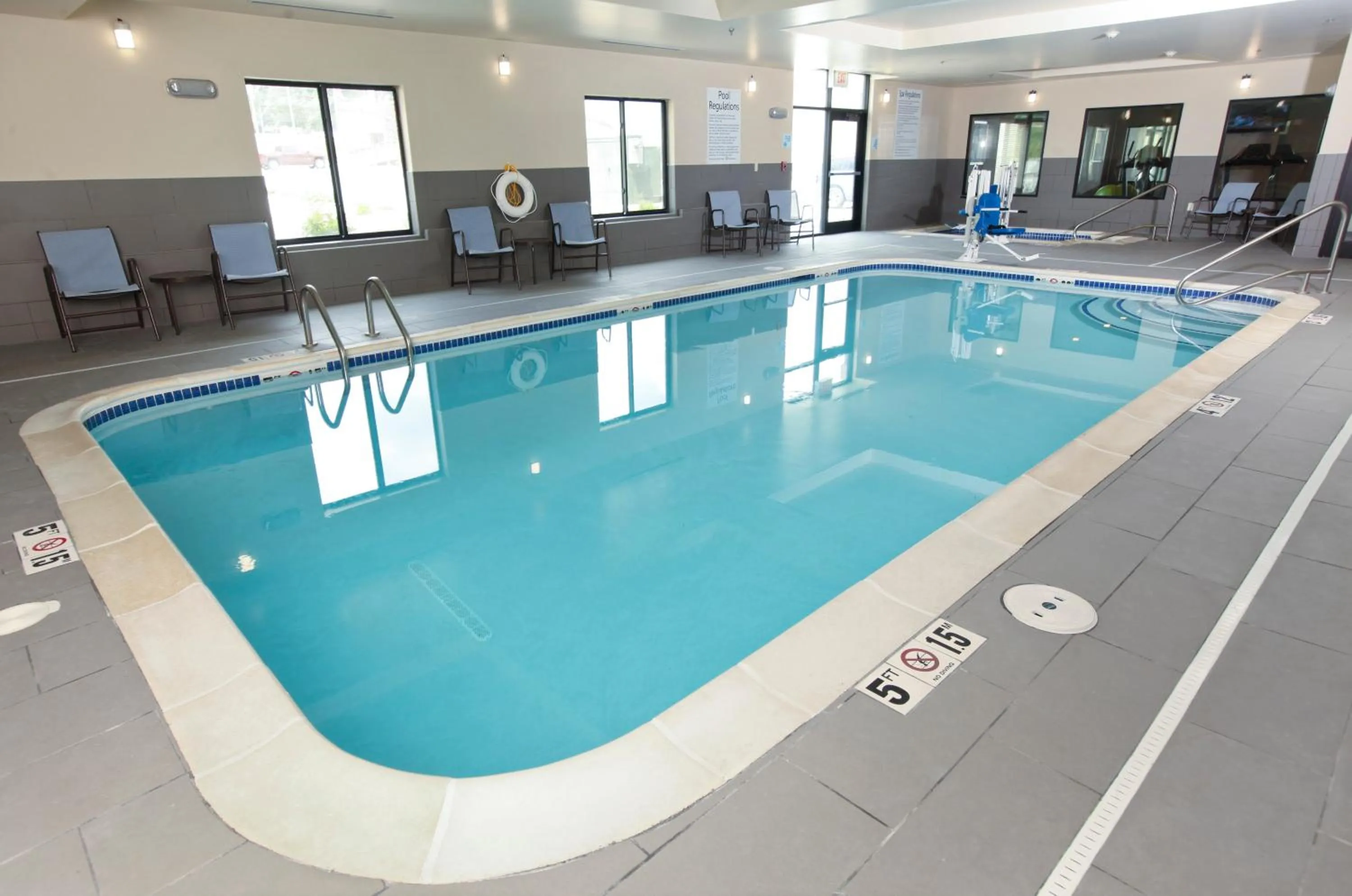 Swimming pool in Holiday Inn Express & Suites Omaha South Ralston Arena by IHG