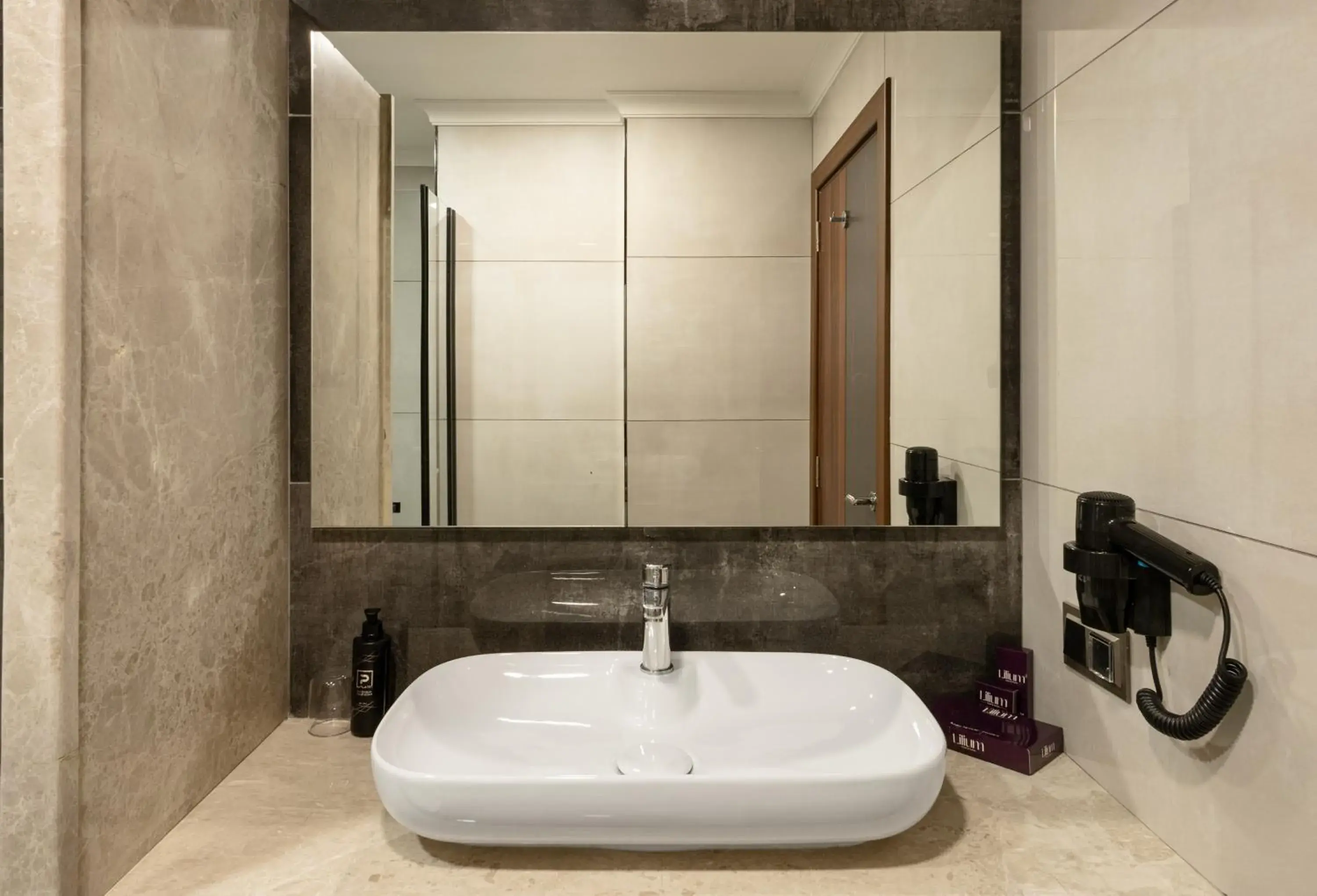 Bathroom in Lilium Hotel & Suites Bathroom in Lilium Hotel & Suites