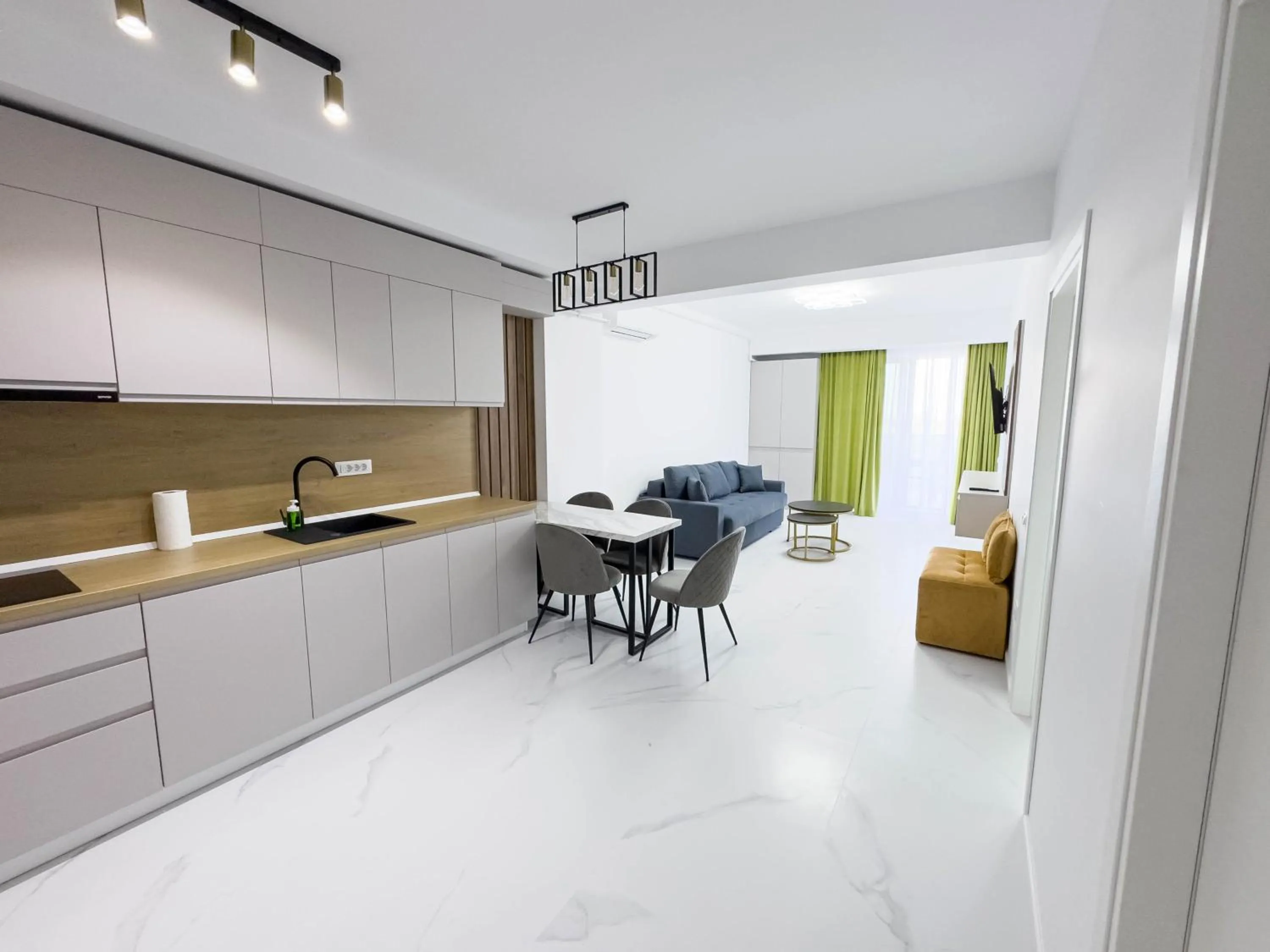 Kitchen or kitchenette in Wave 6 Apartments