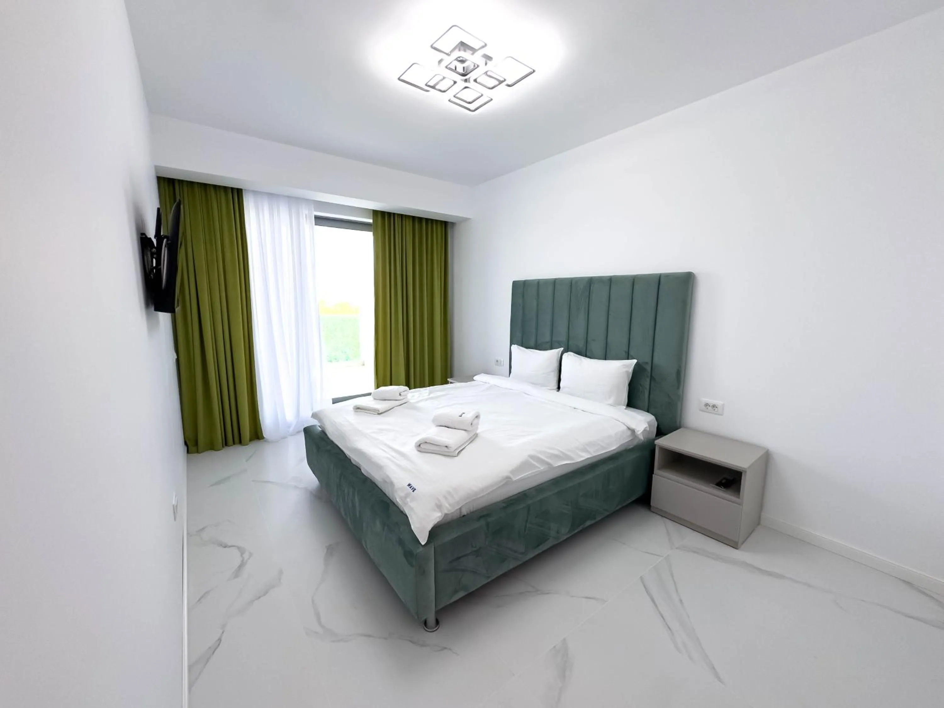 Bed in Wave 6 Apartments