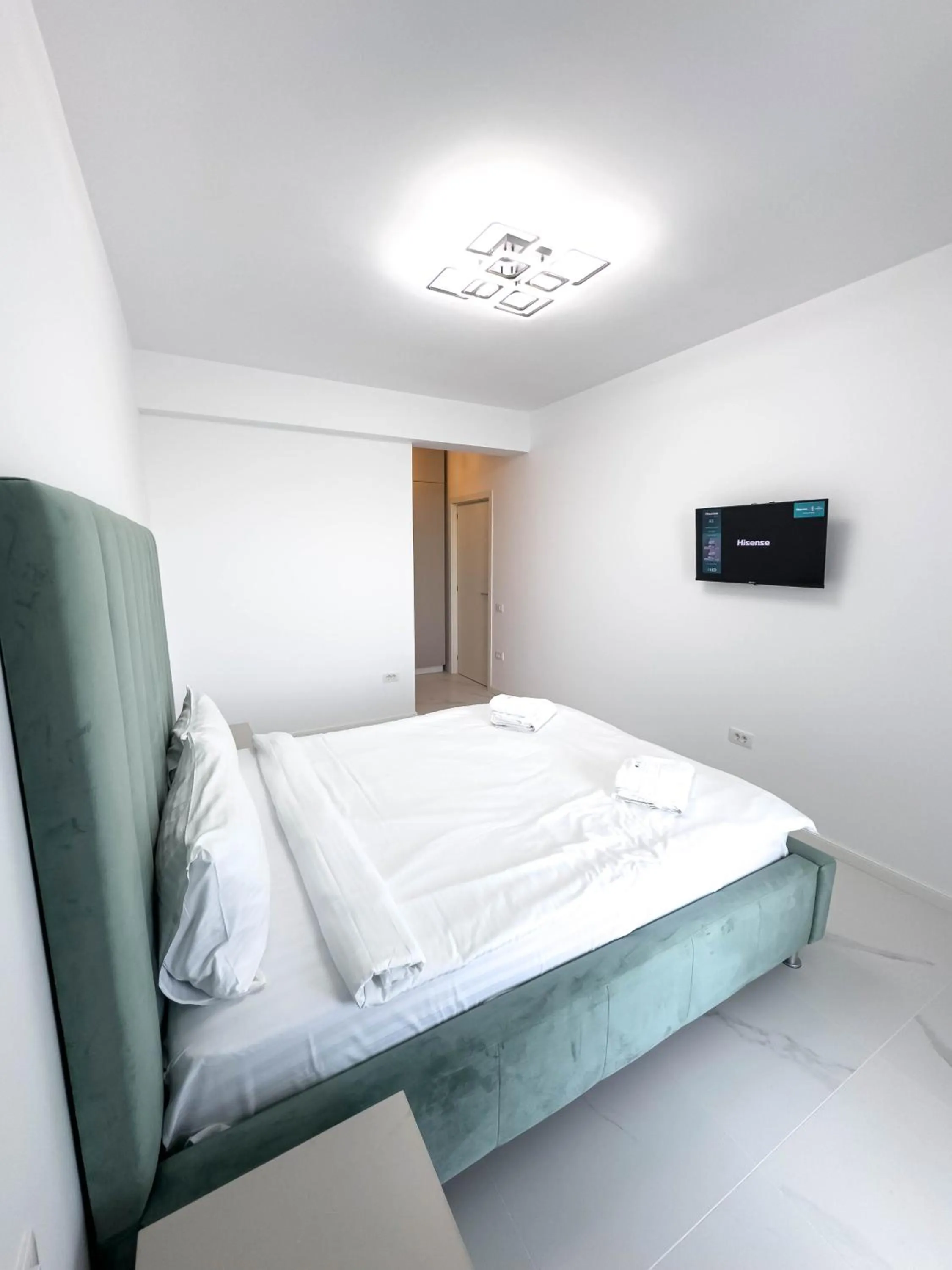 Bed in Wave 6 Apartments