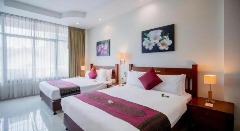 Bed in Hyton Leelavadee Hotel