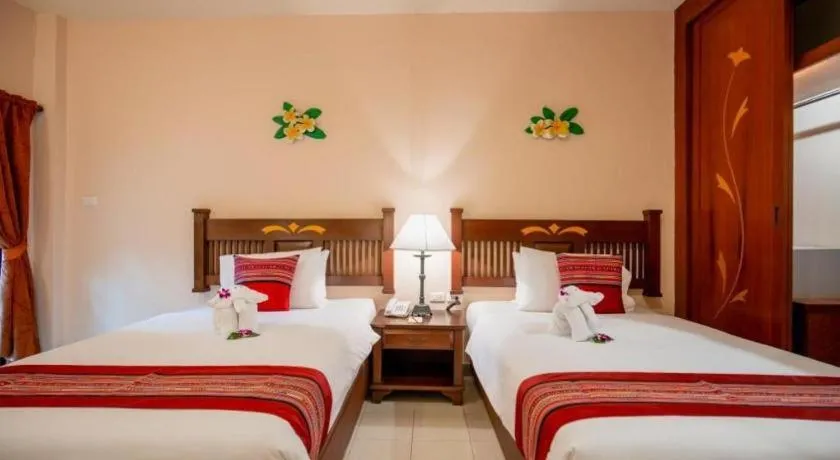 Bed in Hyton Leelavadee Hotel