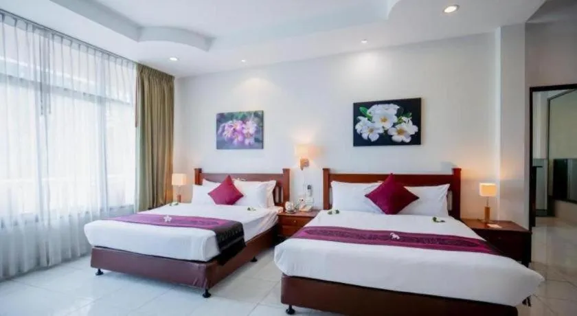 Bed in Hyton Leelavadee Hotel