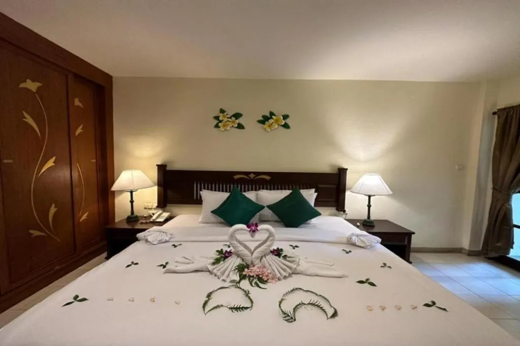 Bed in Hyton Leelavadee Hotel