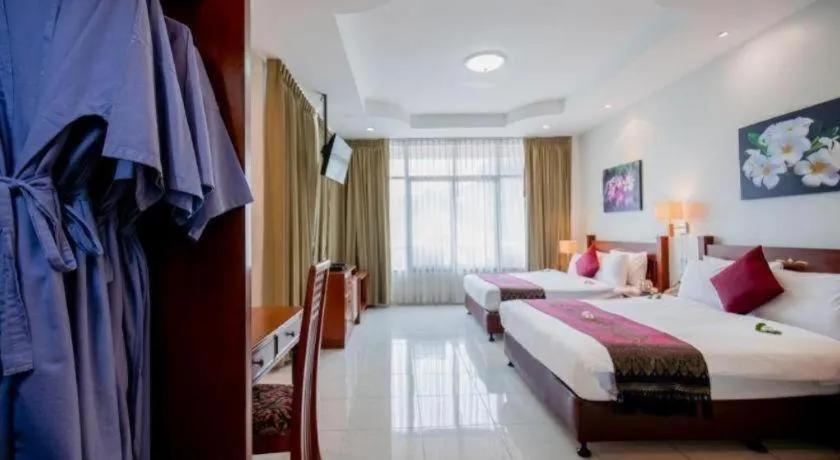 Bed in Hyton Leelavadee Hotel