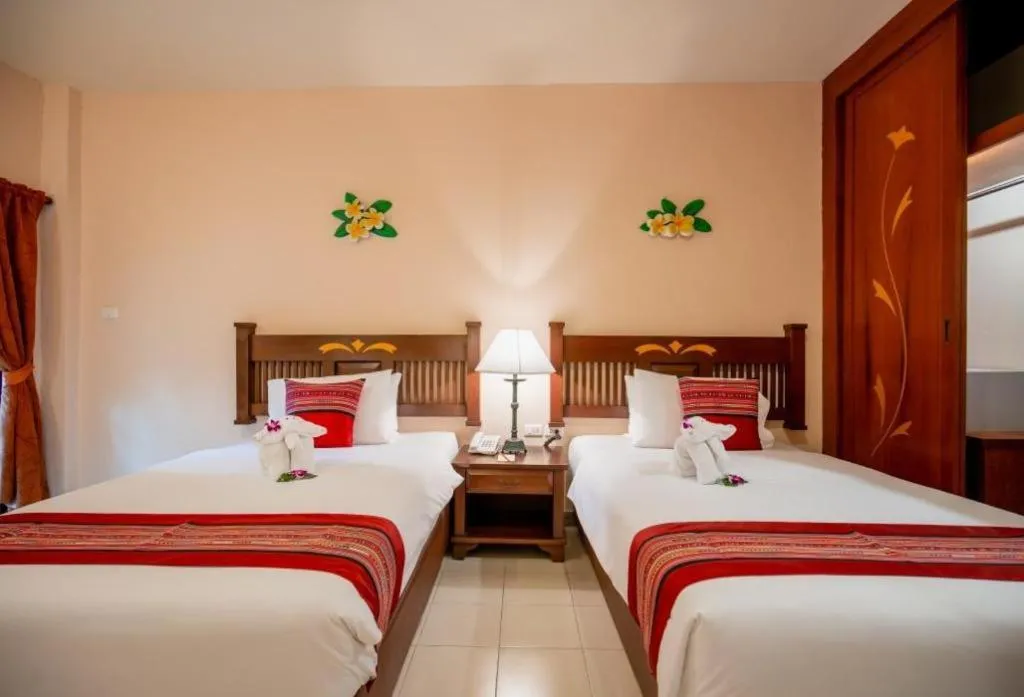 Bed in Hyton Leelavadee Hotel