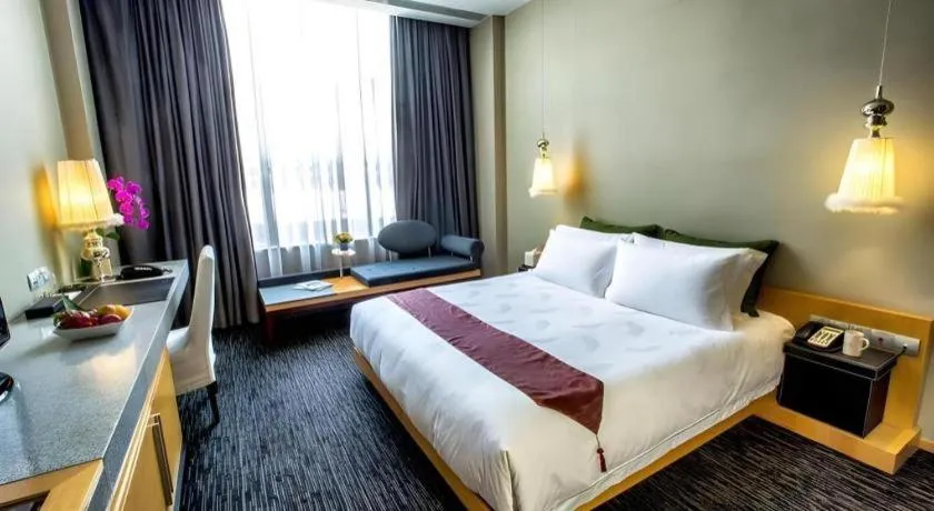 Bed in Guangzhou Carat Hotel