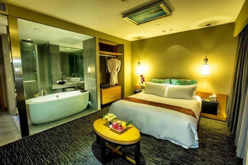 Bed in Guangzhou Carat Hotel