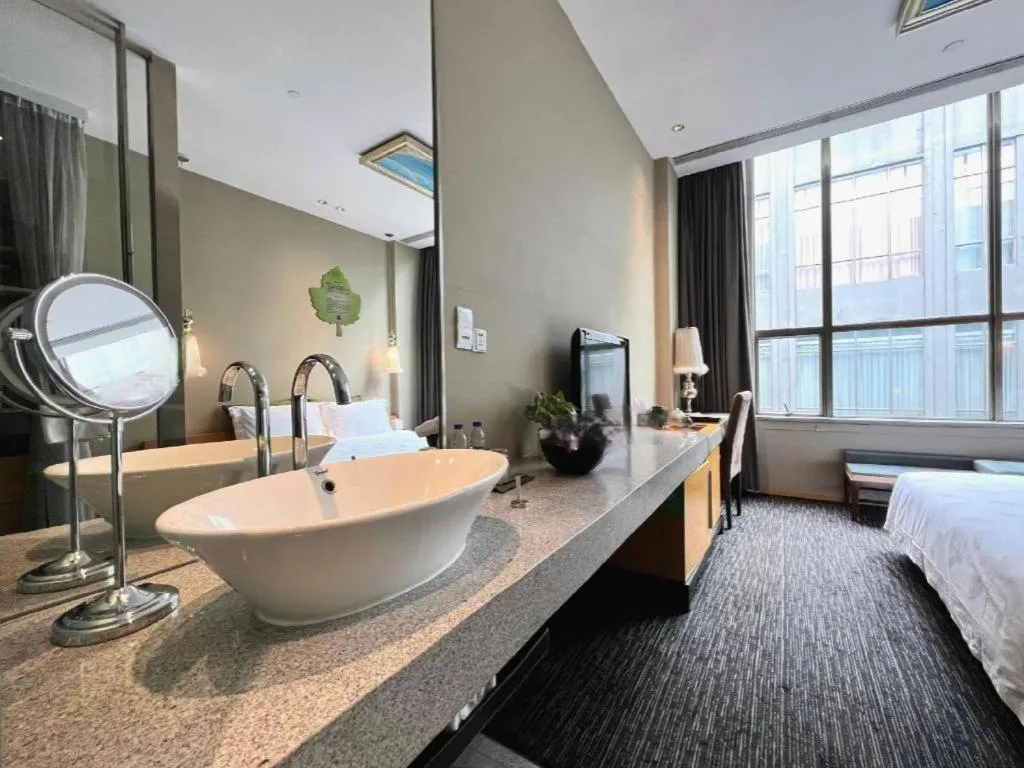 Bed in Guangzhou Carat Hotel