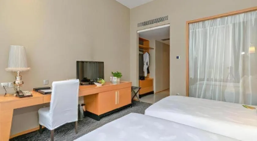 Bed in Guangzhou Carat Hotel
