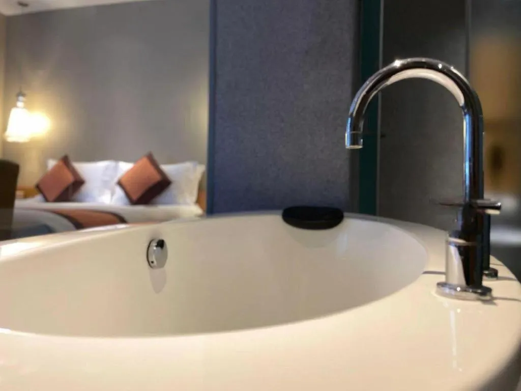 Bed in Guangzhou Carat Hotel