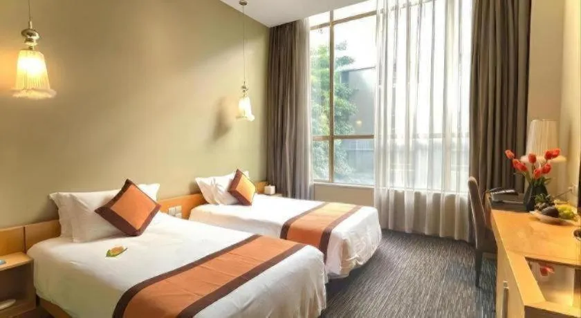 Bed in Guangzhou Carat Hotel