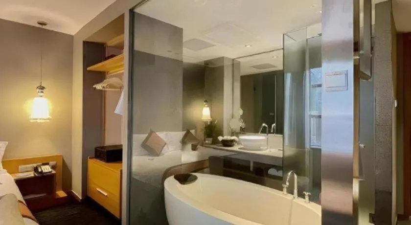 Bed in Guangzhou Carat Hotel