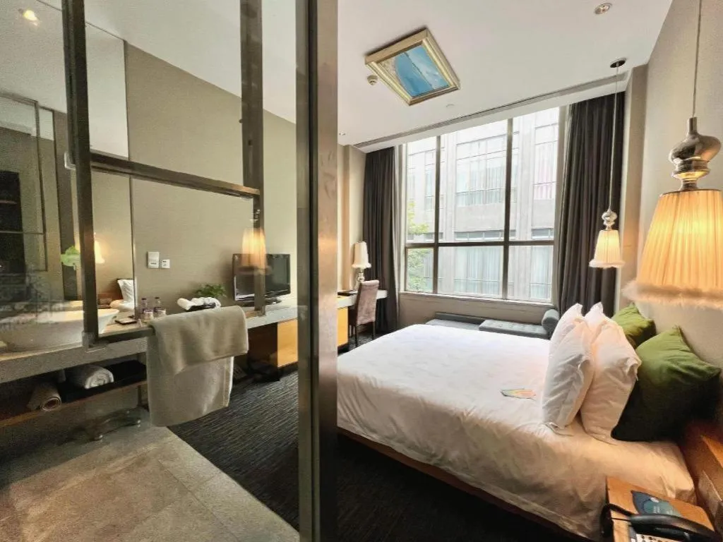 Bed in Guangzhou Carat Hotel