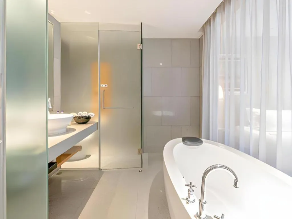 Bed in Guangzhou Carat Hotel