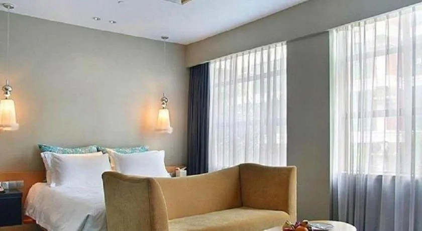 Bed in Guangzhou Carat Hotel