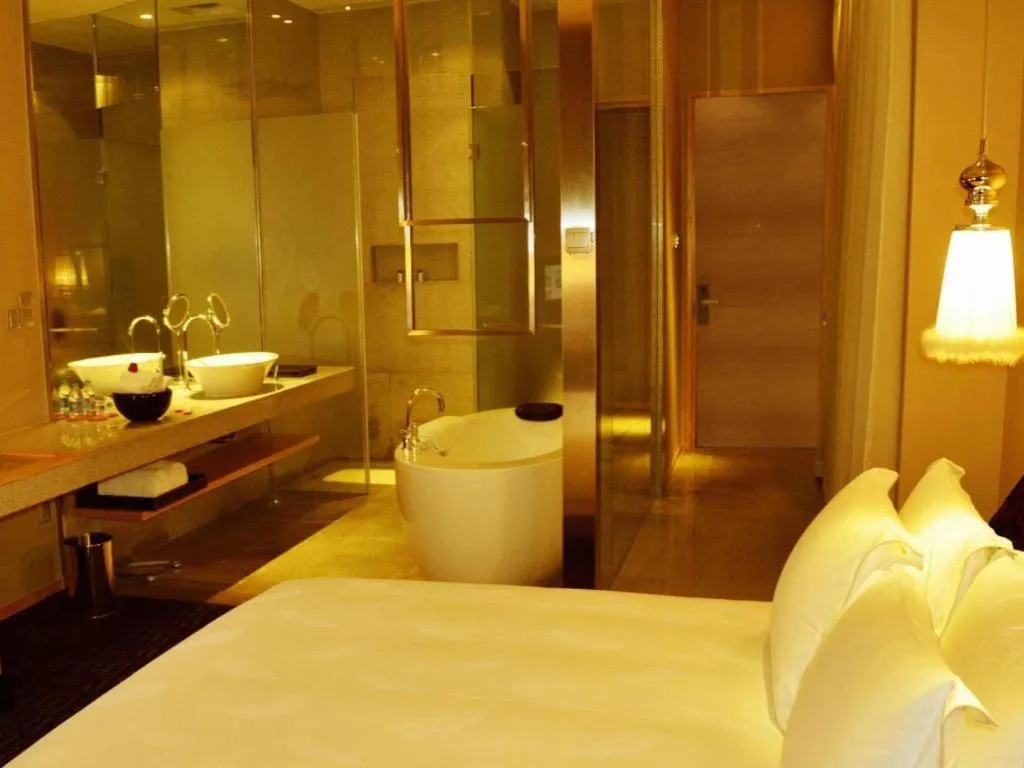 Bed in Guangzhou Carat Hotel