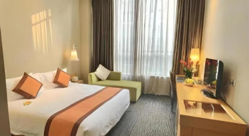 Bed in Guangzhou Carat Hotel