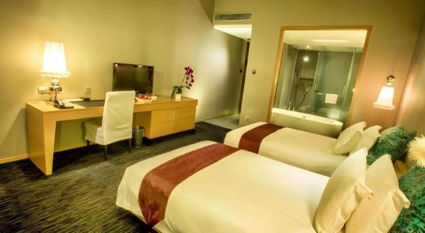 Bed in Guangzhou Carat Hotel