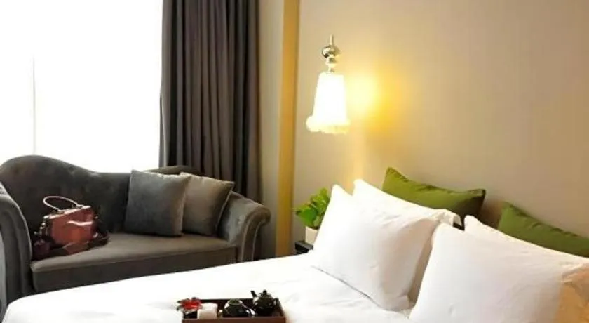 Bed in Guangzhou Carat Hotel