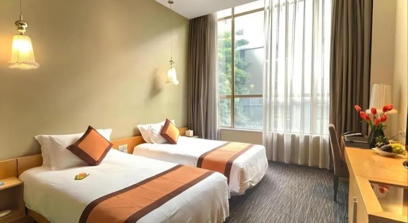 Bed in Guangzhou Carat Hotel