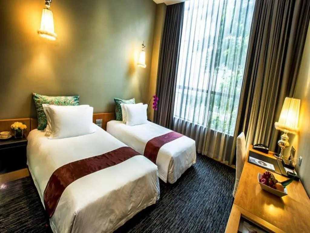 Bed in Guangzhou Carat Hotel