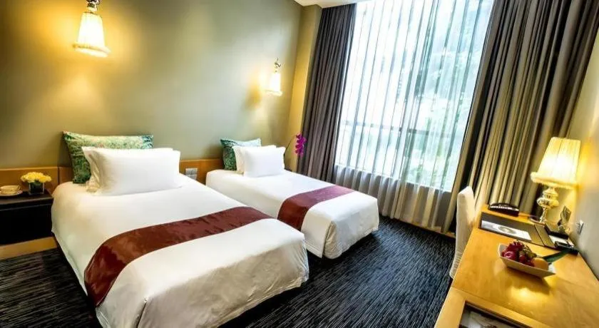 Bed in Guangzhou Carat Hotel