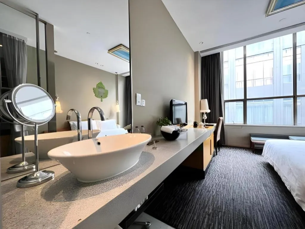 Bed in Guangzhou Carat Hotel