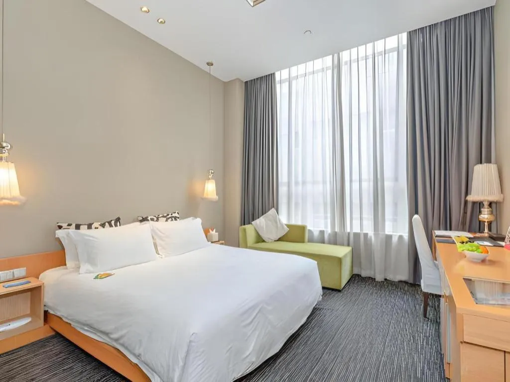 Bed in Guangzhou Carat Hotel