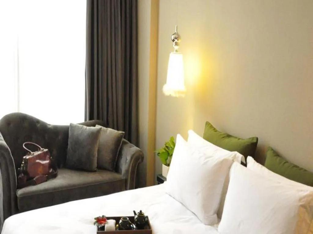 Bed in Guangzhou Carat Hotel