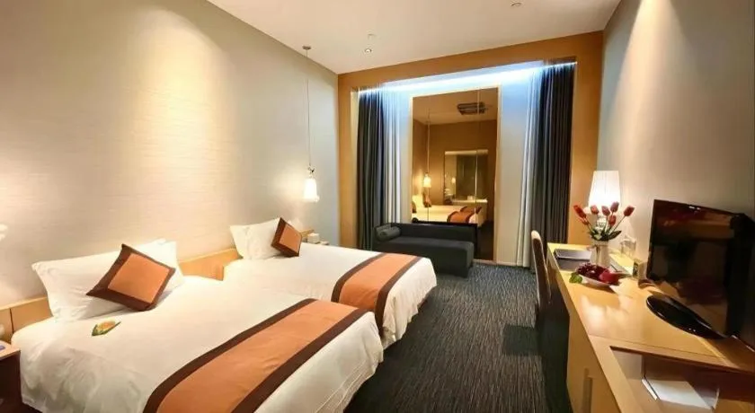 Bed in Guangzhou Carat Hotel