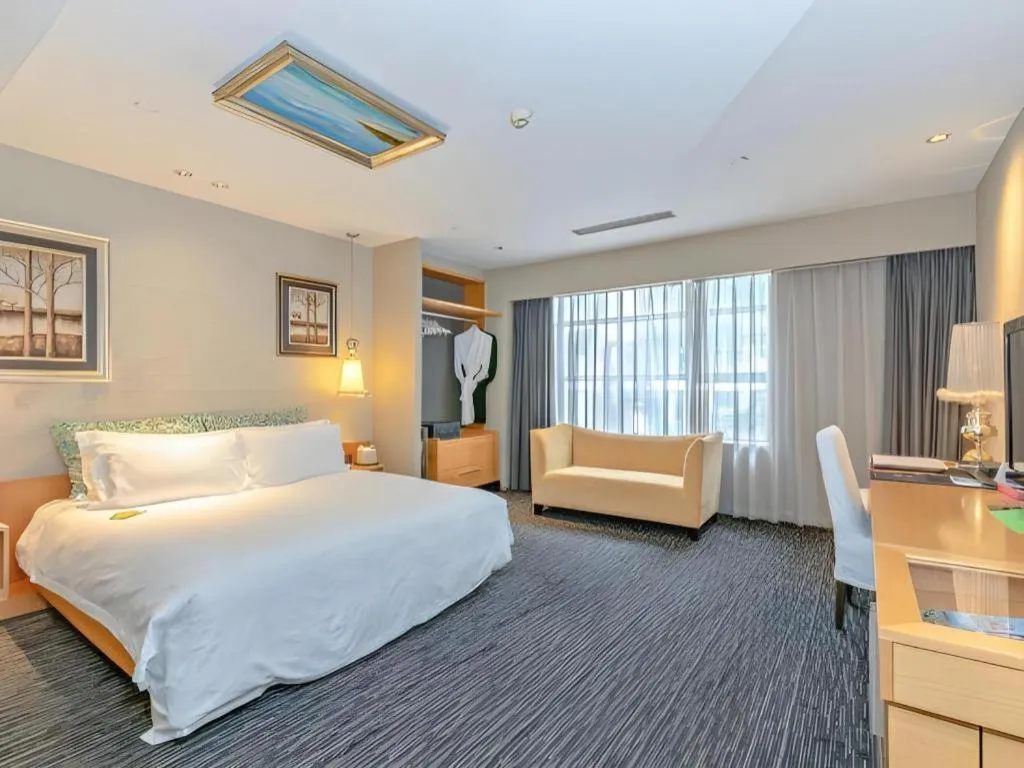 Bed in Guangzhou Carat Hotel