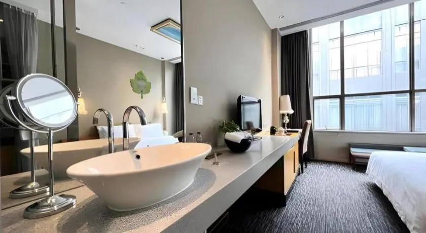 Bed in Guangzhou Carat Hotel