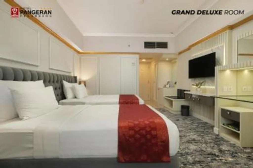 Bed in Hotel Pangeran