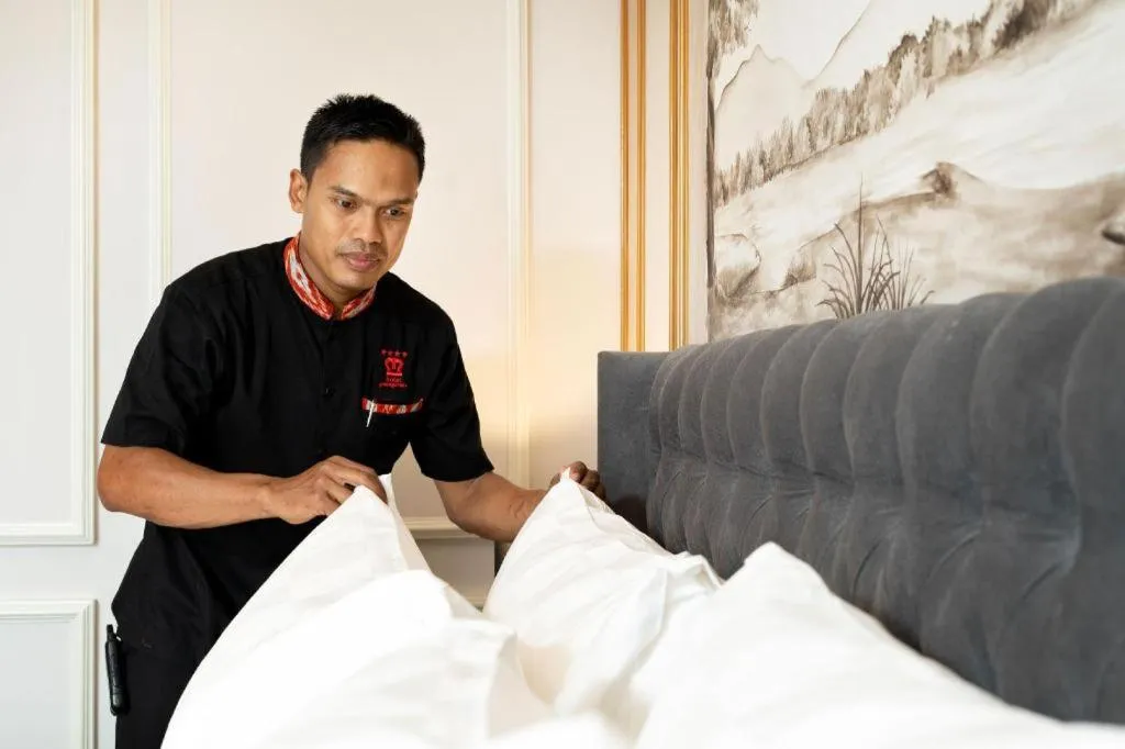 Bed in Hotel Pangeran